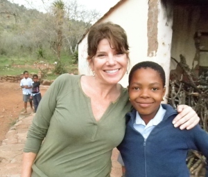 45 years old.  I was going through a pretty bad mid-life crisis.  I needed to do something outside of my norm, so I went to South Africa for three weeks to volunteer on two animal reserves.  One day we went to a school, it was one of the best trips and days of my life.